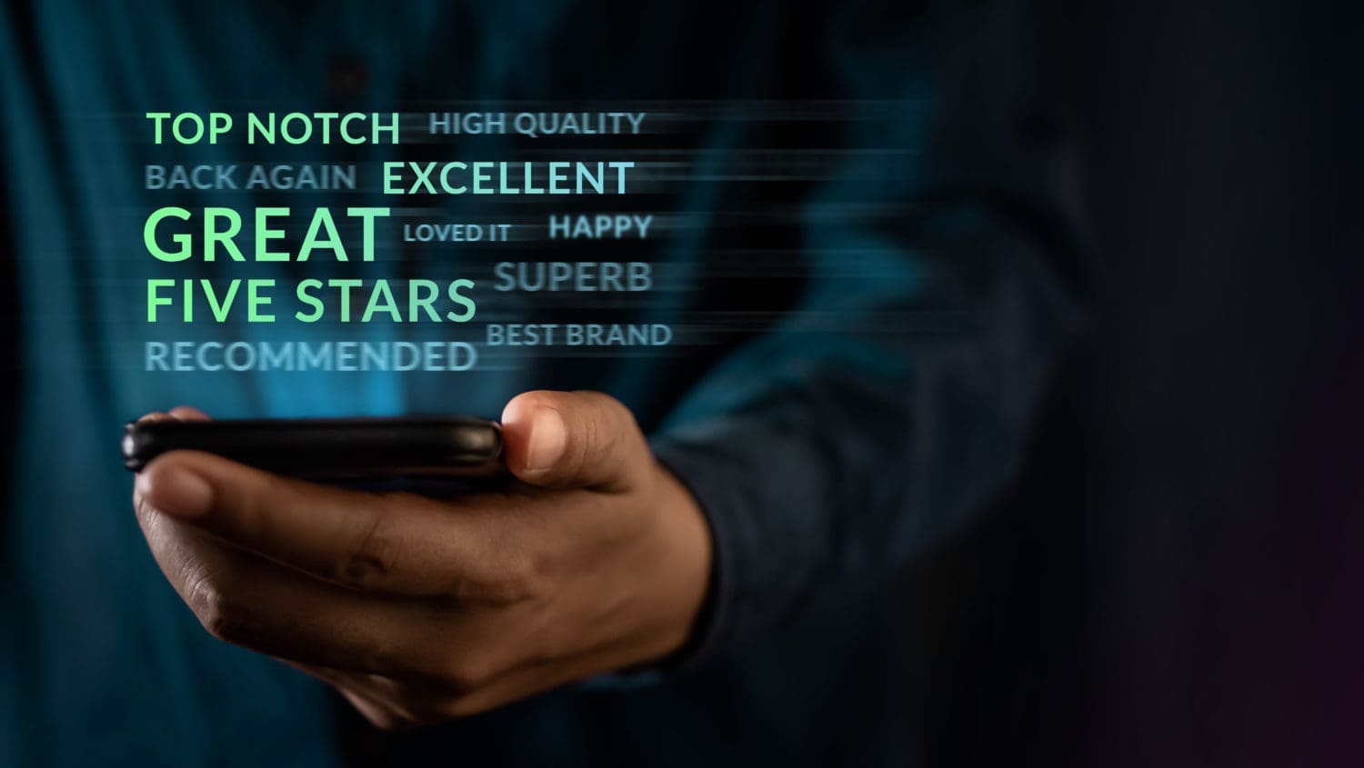 A man holding a cell phone with the words topnotch great five stars recommended.