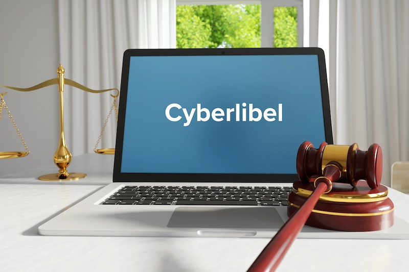 A laptop with the word cyberbill on it to help remove slander from internet search results.