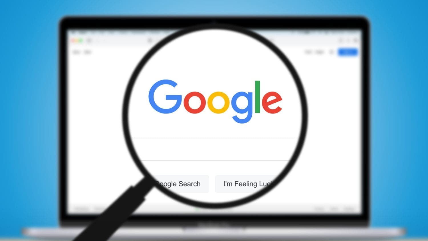 A magnifying glass over the google logo on a laptop.