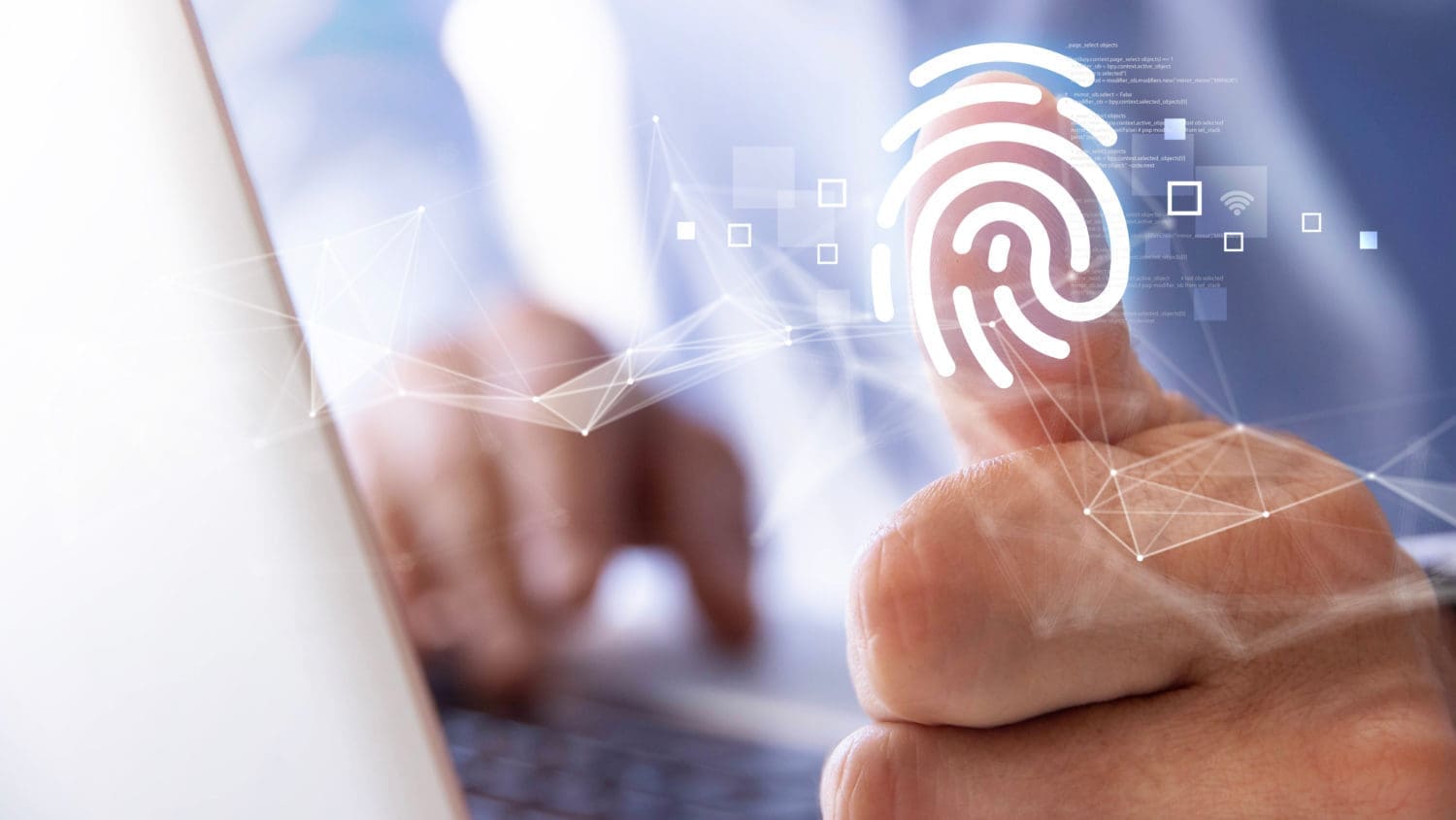 A man is pointing at a fingerprint on a laptop screen.
