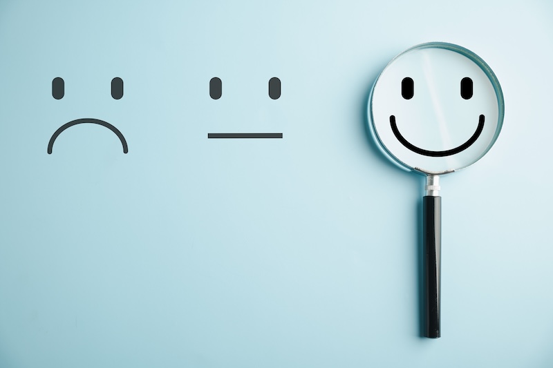Using a magnifying glass with a smiley face, you can restore an online reputation.