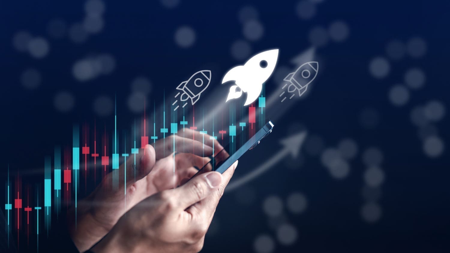 A man is holding a phone with a rocket on it.