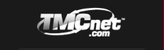 TMCnet.com logo in bold white and gray letters on a black background, with a white swoosh encircling part of the text.