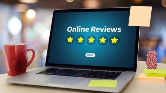 Positive Reviews showing on a laptop