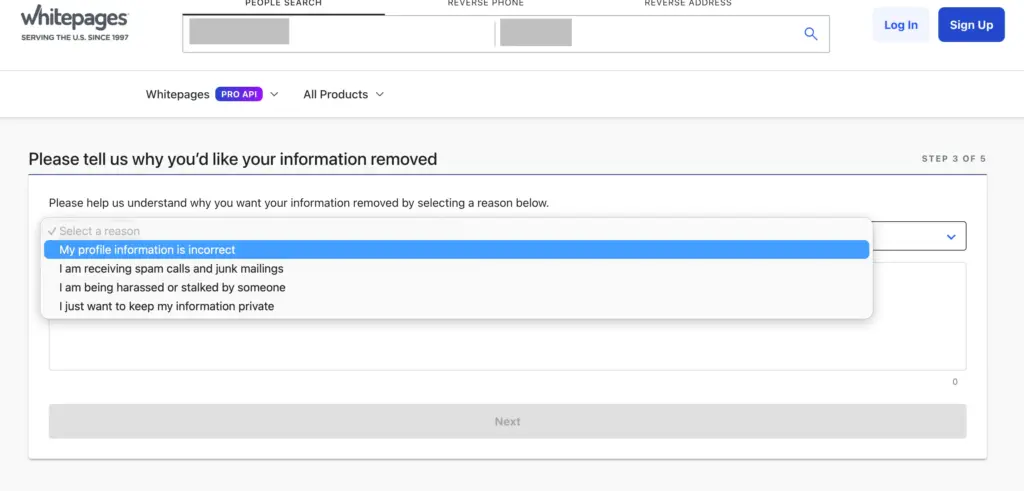 A computer screen shows a Whitepages page asking why a user wants information removed, with “My profile information is incorrect” selected from a dropdown menu—providing an example of how to remove your information from Whitepages.