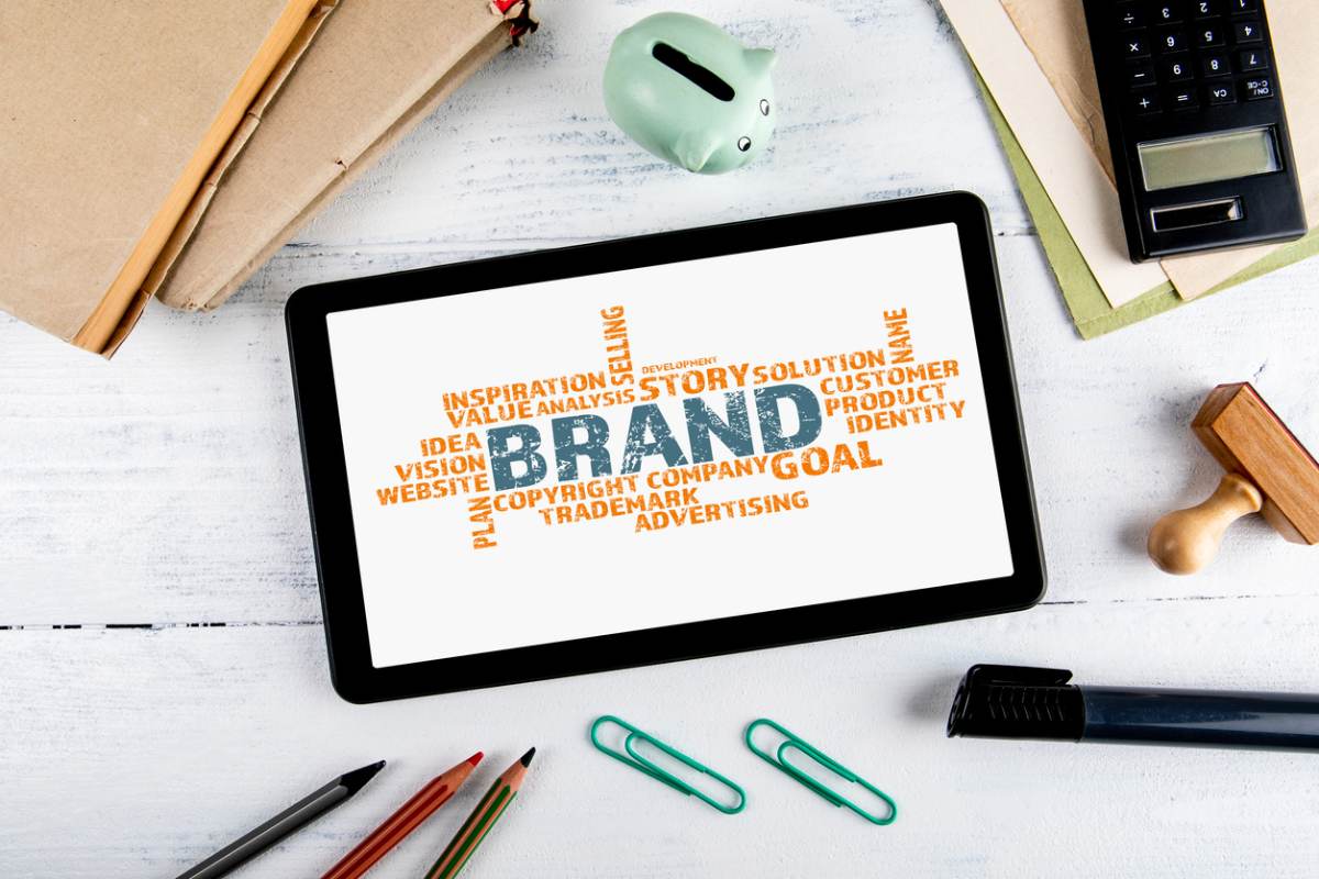 a tablet with the word brand written on it.