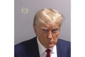 Donald Trump in a mugshot photo.