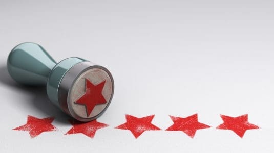 Review stars with a stamp
