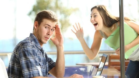 Embarrassed Guy ignoring girl in window