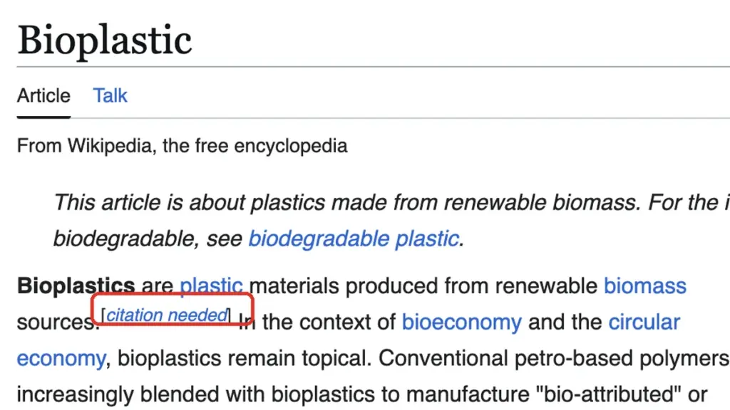 A screenshot of a Wikipedia page for "Bioplastic" shows the introductory paragraph, with part highlighted and a blue “[citation needed]” label in brackets, enclosed in a red box—showcasing Wikipedia’s call for reliable sources.