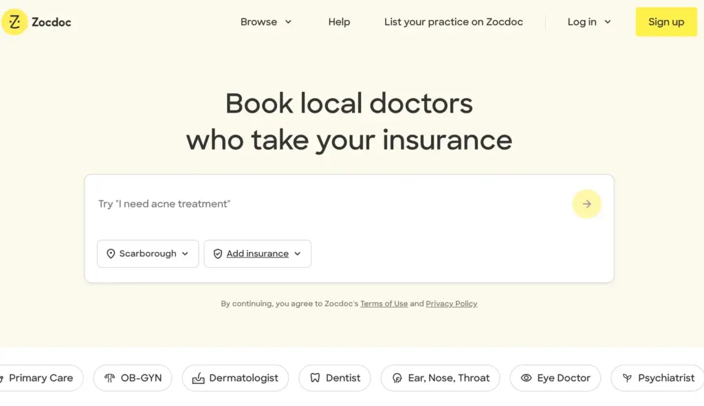Zocdoc homepage with the text “Book local doctors who take your insurance.” Search bar allows users to enter a condition, location, and insurance. Various doctor specialties are listed in buttons below.